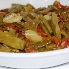 A picture of Green beans with olive oil.