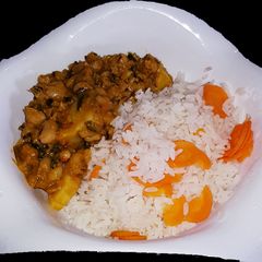 A picture of Beans porridge and white rice.