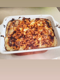 Una foto de Papas gratinadas