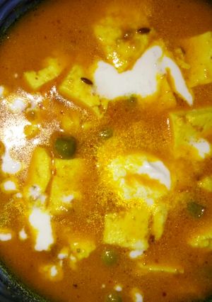 A picture of Matar paneer without onion and garlic.