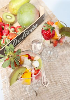Une photo de Salade de fruits jus d’orange et lait de coco