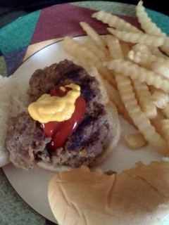 A picture of hamburger and Fries.