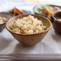 A picture of Brown rice cooked in a japanese clay pot.
