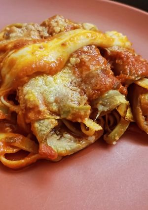 A picture of Eggplant Roll-Ups with Tagliatelle and Meat Sauce.