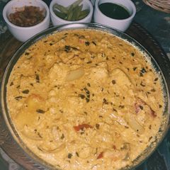 A picture of Shahi Paneer with leftover paneer tikka.