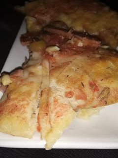 Una foto de Pizza sencilla