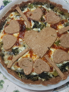 Una foto de Tarta integral de espinaca, zucchini y cebolla
