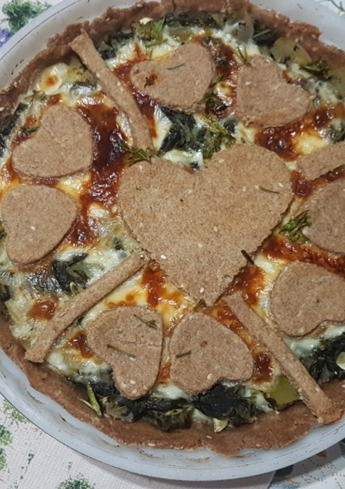 Una foto de Tarta integral de espinaca, zucchini y cebolla