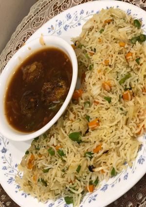A picture of Fried rice and manchurian.