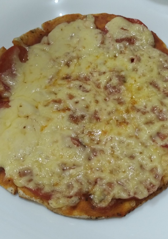 Una foto de Mini Pizza en pan árabe o pan pita