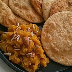 A picture of Daal Kachori With Sooji Halwa.