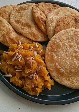 A picture of Daal Kachori With Sooji Halwa.