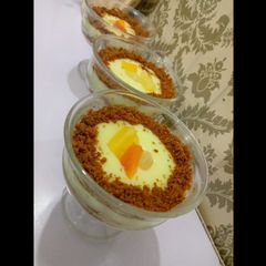 A picture of Custard with biscuit.