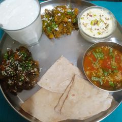 A picture of Sunday Special Gujarati Thali For Lunch.