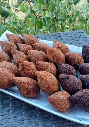 A picture of Potato Kibbeh Stuffed with Meat.