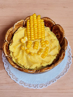 Una foto de Hummus con choclo 🌽