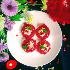 A picture of Beetroot hummus crostini.