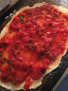 A picture of No oil no onion PIZZA SAUCE with fresh herbs.