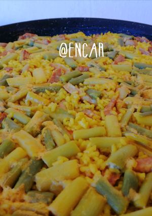 Una foto de Arroz con secreto y ajos tiernos
