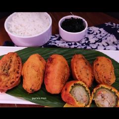 A picture of Purvora karela(stuffed Bitter gourd fritters).