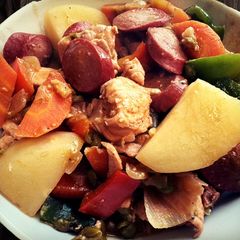 A picture of Chicken Afritada sa Gata.