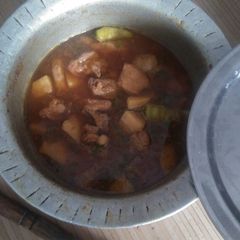 A picture of Aaloo chicken simple desi saalan.