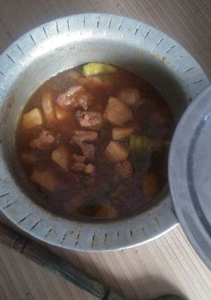 A picture of Aaloo chicken simple desi saalan.