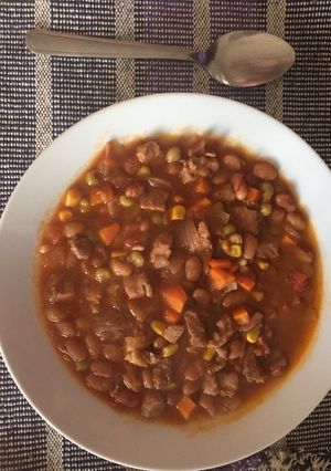 Una foto de Guiso de porotos frutilla