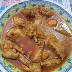 A picture of Chicken qorma.