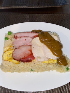 A picture of Special fried rice with curry sauce - UK chip shop style.