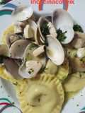 Ravioli ripieni di gele' di vongole al pesce spada e vongole