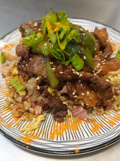 Una foto de Ternera china salteada con cebolla y pimientos