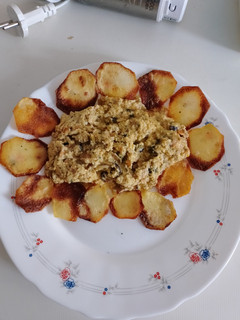 Una foto de Revuelto de Mejillones en escabeche
