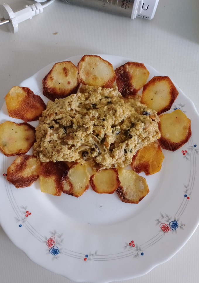 Una foto de Revuelto de Mejillones en escabeche