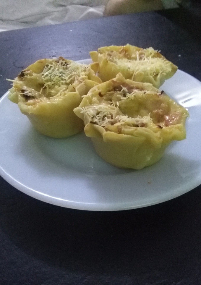 Una foto de Canastitas jamón queso cebolla y aceitunas