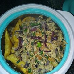 A picture of Fried potatoes with scrambled egg.