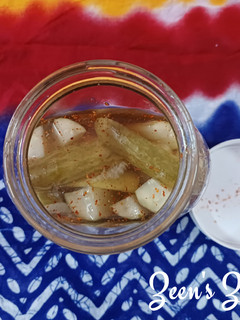 A picture of Mukhalal or Arabic Pickled Cucumbers.