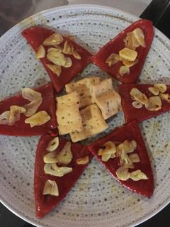 Una foto de Pimientos del piquillo al ajillo