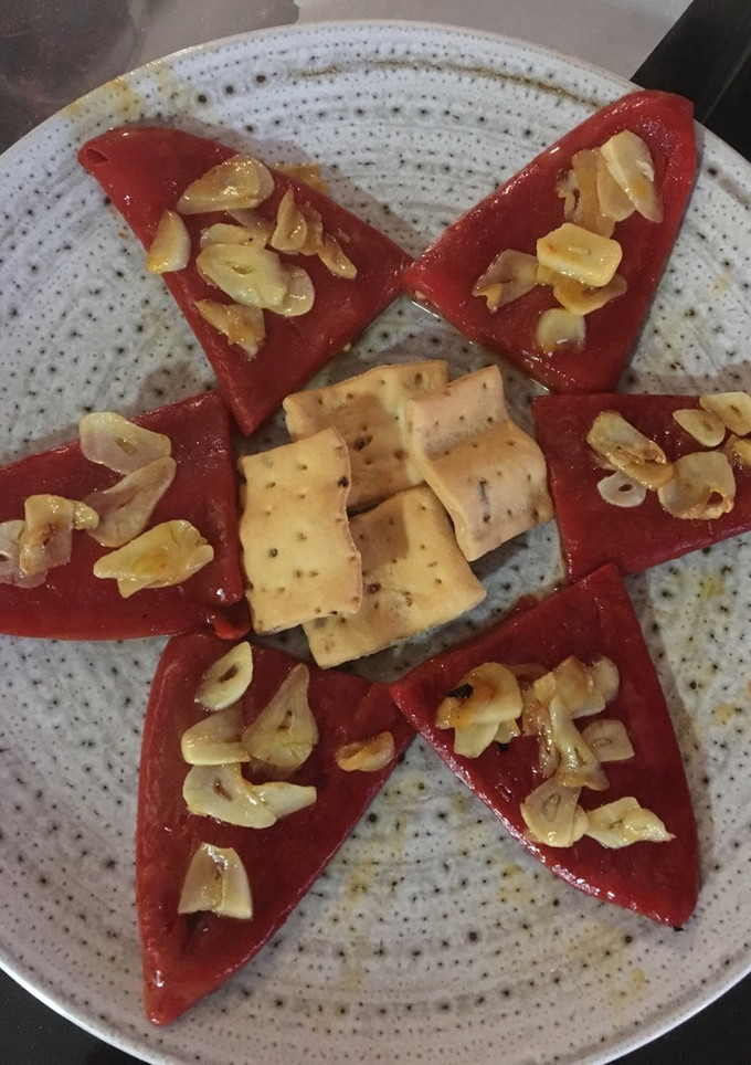 Una foto de Pimientos del piquillo al ajillo