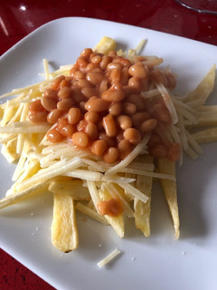 A picture of Home made chips/Fries.