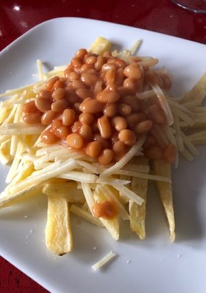 A picture of Home made chips/Fries.