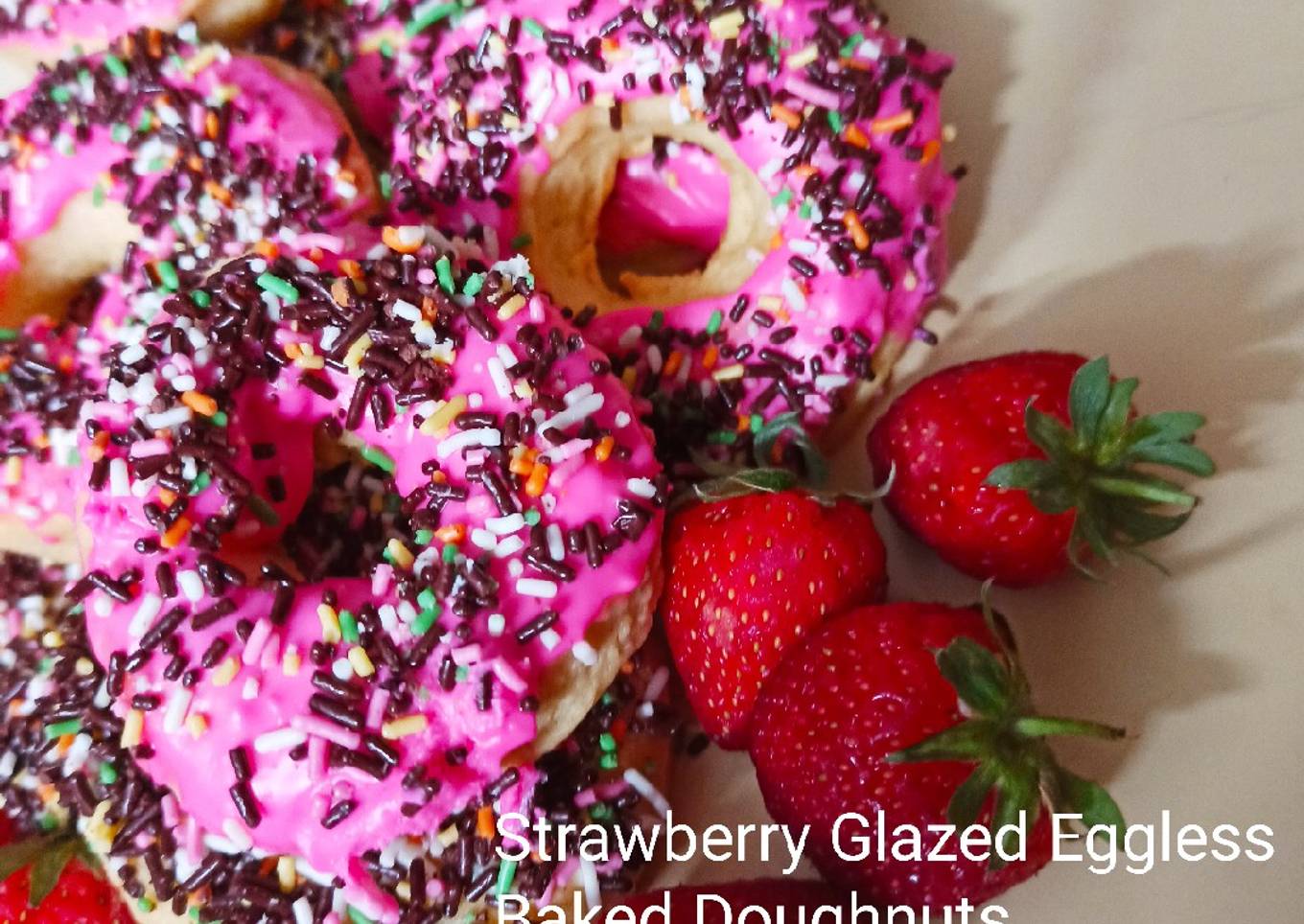 Strawberry Glazed Eggless Baked Doughnuts