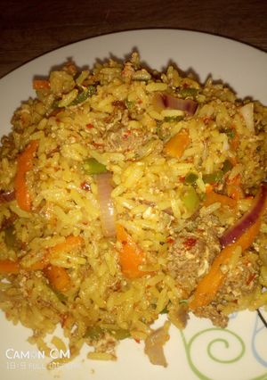 A picture of Mince meat and egg jallof rice.