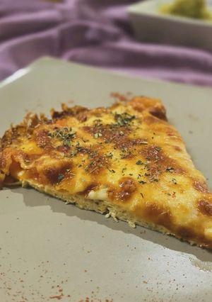 Una foto de Pizza de Pollo