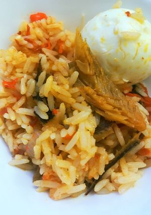 A picture of Oil rice and bonga fish.