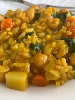 Una foto de Arroz meloso de curry de garbanzos