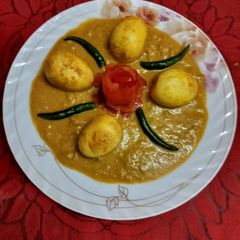 A picture of Green Chillies Egg Butter Masala.