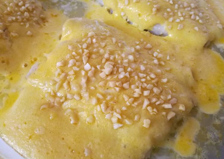 Filetes de fogonero al horno con alioli y almendras