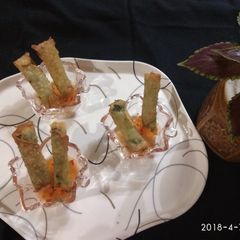 A picture of Spinach paneer cigar.