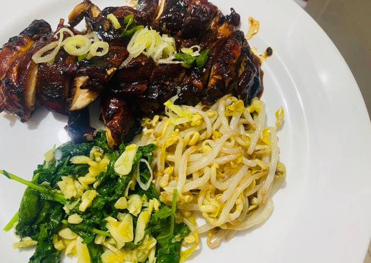 Grilled chicken with dark soy sauce with crispy kale